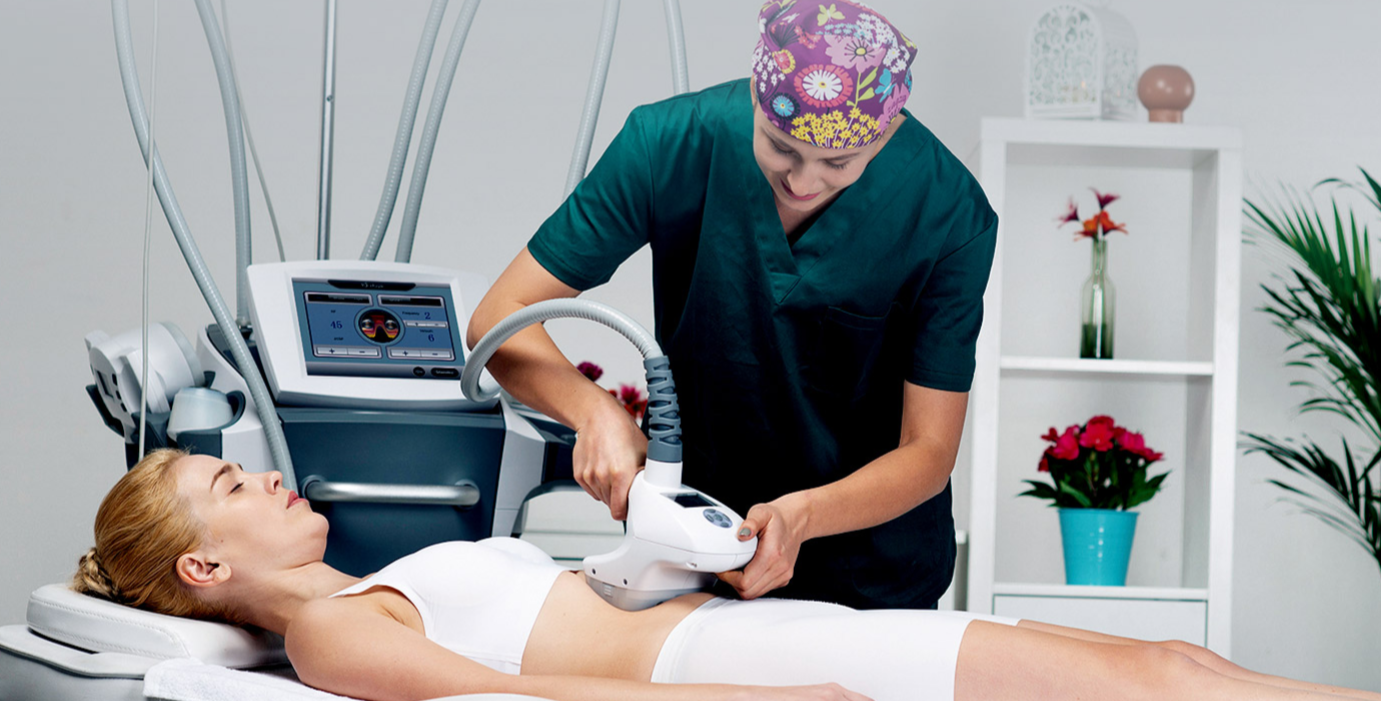 A scene where a slimming machine is being used.